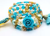 Turquoise and Gold Flower Charm Bracelet