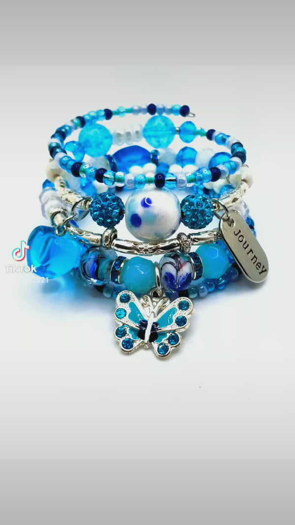 Blue, White, and Silver Charm Bracelet